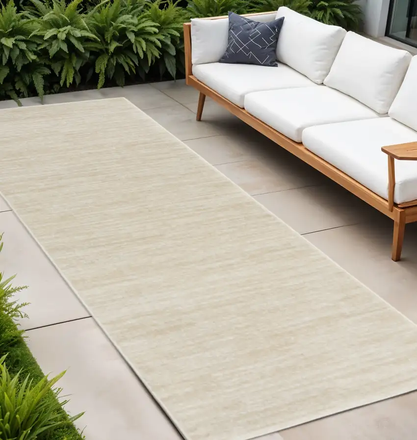 8' Beige And Ivory Indoor Outdoor Runner Rug Photo 1