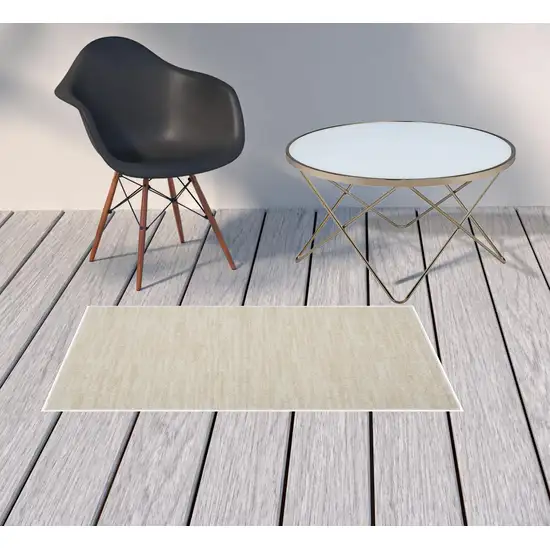 2' X 4' Ivory And Beige Non Skid Indoor Outdoor Runner Rug Photo 2
