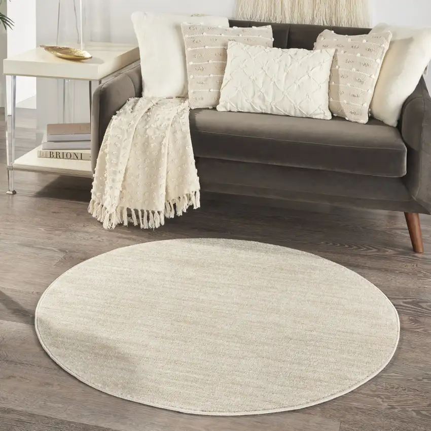 4' Beige And Ivory Round Indoor Outdoor Area Rug Photo 7