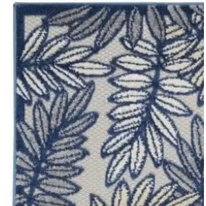 Photo of 2' X 6' Ivory And Navy Floral Non Skid Indoor Outdoor Runner Rug