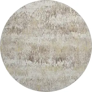 Photo of 8' X 8' Ivory Beige And Brown Striped Washable Round Rug With UV Protection