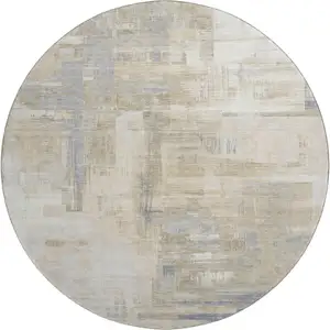 Photo of 8' X 8' Ivory Beige And Gray Abstract Washable Round Rug With UV Protection