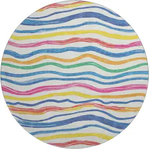 Photo of 8' X 8' Ivory Blue Yellow And Pink Striped Washable Round Rug With UV Protection