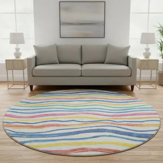 8' X 8' Ivory Blue Yellow And Pink Striped Washable Round Rug With UV Protection Photo 2