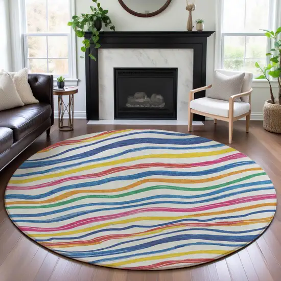 8' X 8' Ivory Blue Yellow And Pink Striped Washable Round Rug With UV Protection Photo 4