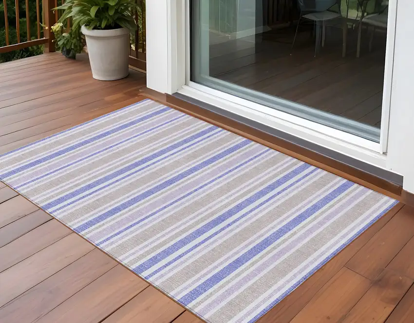 3' X 4' Ivory Blue and Gray Striped Washable Non Skid Indoor Outdoor Area Rug Photo 1