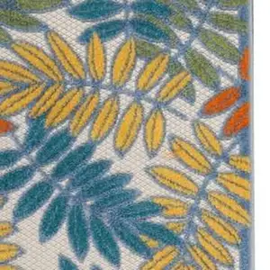 Photo of 2' X 6' Ivory Floral Non Skid Indoor Outdoor Runner Rug