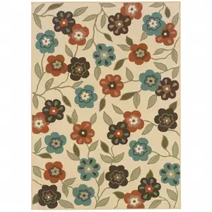 Photo of 6' X 9' Ivory Floral Stain Resistant Indoor Outdoor Area Rug