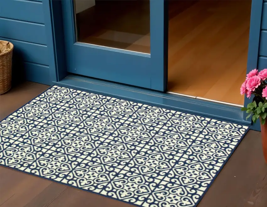 Ivory and Blue Geometric Stain Resistant Indoor Outdoor Area Rug Photo 1