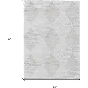 Photo of 3' X 5' Ivory Geometric Washable Non Skid Indoor Outdoor Area Rug