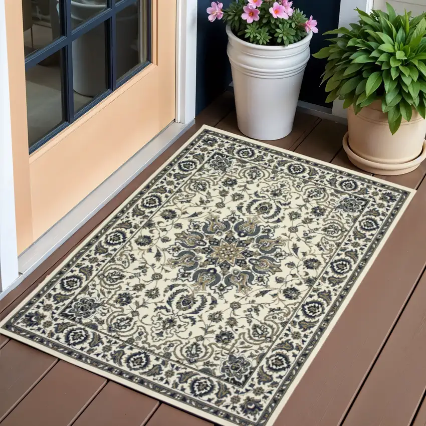 Ivory and Blue Oriental Stain Resistant Indoor Outdoor Area Rug Photo 1