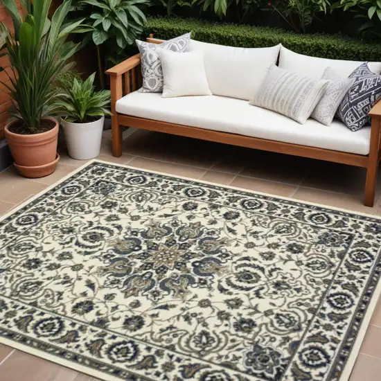 Ivory and Blue Oriental Stain Resistant Indoor Outdoor Area Rug Photo 1