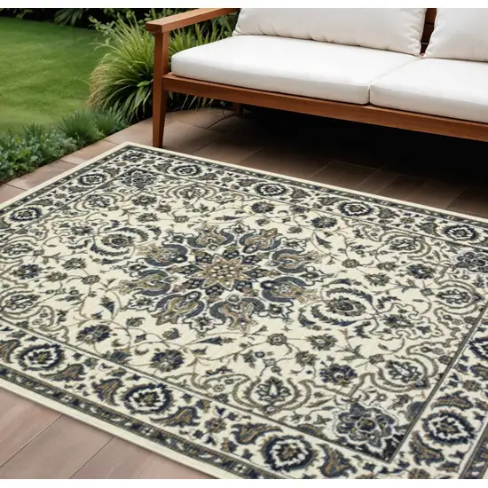 Ivory And Blue Oriental Indoor Outdoor Area Rug Photo 1
