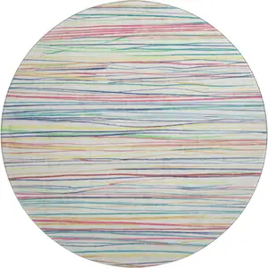 Photo of 8' X 8' Ivory Red Yellow And Green Striped Washable Round Rug With UV Protection