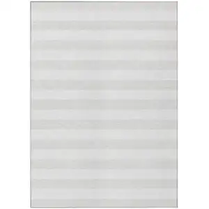 Photo of 3' X 5' Ivory Striped Washable Non Skid Indoor Outdoor Area Rug