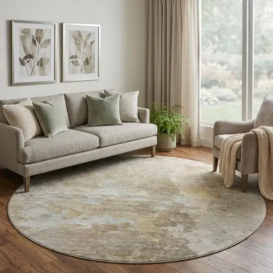 8' X 8' Khaki Gray And Gold Abstract Washable Round Rug With UV Protection Photo 1