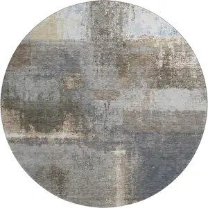 Photo of 8' X 8' Khaki Silver And Blue Abstract Washable Round Rug With UV Protection