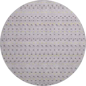 Photo of 8' X 8' Lavender Gold And Gray Striped Washable Round Rug With UV Protection