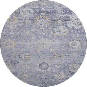 Photo of 8' X 8' Lavender Gold And Ivory Oriental Washable Round Rug With UV Protection