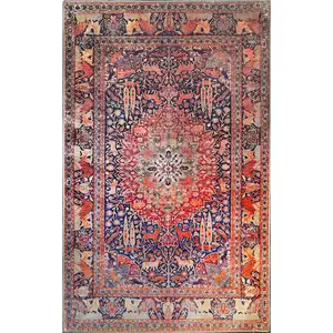 Photo of 7' X 9' Medallion Stain Resistant Area Rug