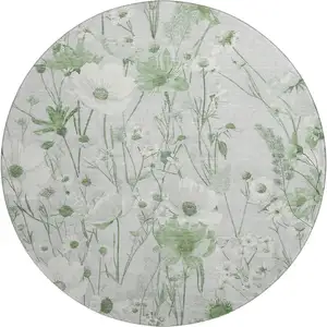 Photo of 8' X 8' Mint Green And Ivory Floral Washable Round Rug With UV Protection