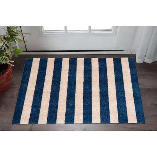 Navy And Sand Striped Tufted Washable Non Skid Area Rug Photo 1