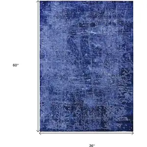 Photo of 3' X 5' Navy Blue Abstract Washable Non Skid Indoor Outdoor Area Rug
