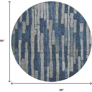 Photo of 8' X 8' Navy Blue And Gray Striped Washable Round Rug With UV Protection