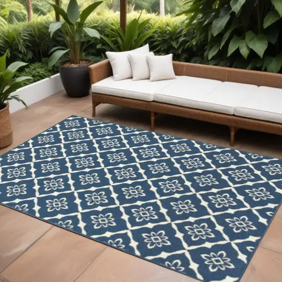 Blue and Ivory Floral Stain Resistant Indoor Outdoor Area Rug Photo 1