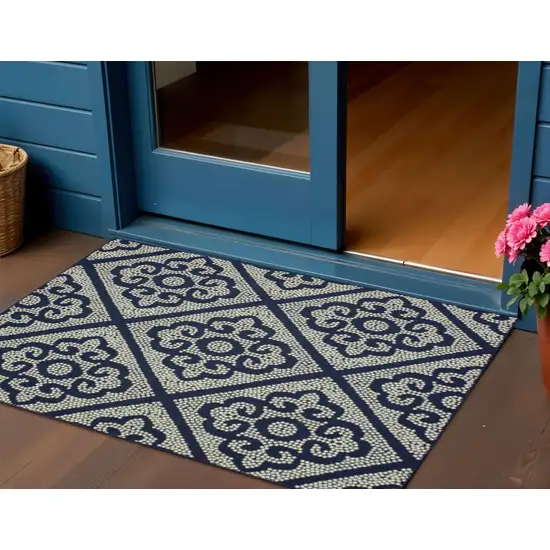 Blue and Ivory Geometric Stain Resistant Indoor Outdoor Area Rug Photo 1