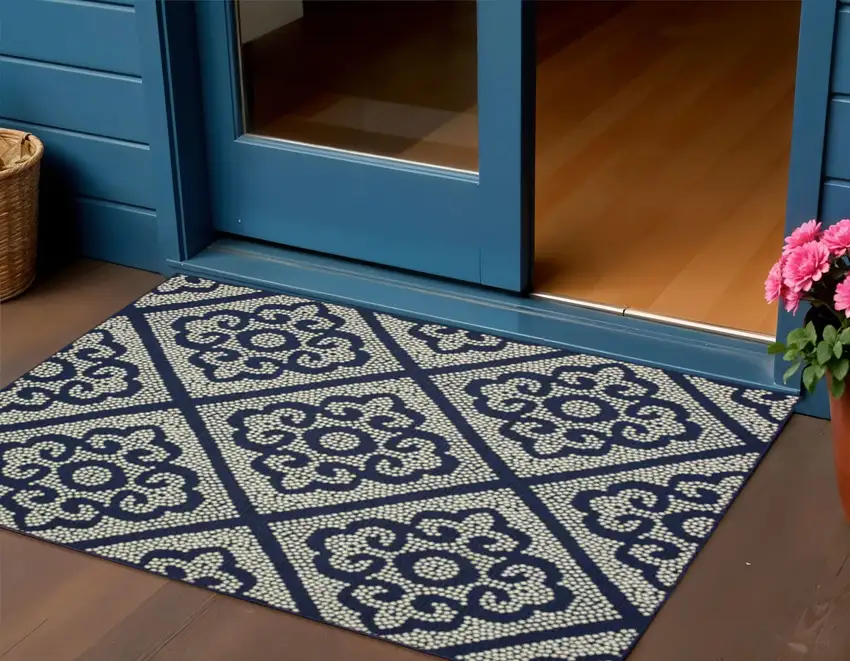 Blue and Ivory Geometric Stain Resistant Indoor Outdoor Area Rug Photo 1