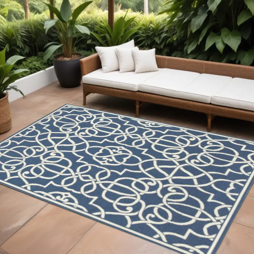 Blue and Ivory Geometric Stain Resistant Indoor Outdoor Area Rug Photo 1