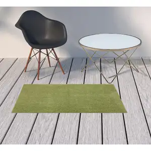 Photo of 2' X 4' Non Skid Indoor Outdoor Runner Rug