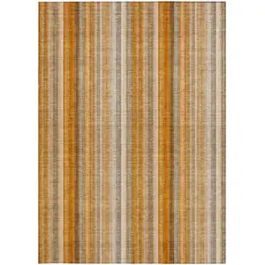 Photo of 3' X 5' Orange Ivory and Gray Striped Washable Non Skid Indoor Outdoor Area Rug