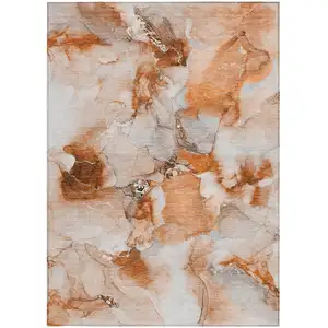 Photo of 3' X 4' Orange and Ivory Abstract Washable Non Skid Indoor Outdoor Area Rug