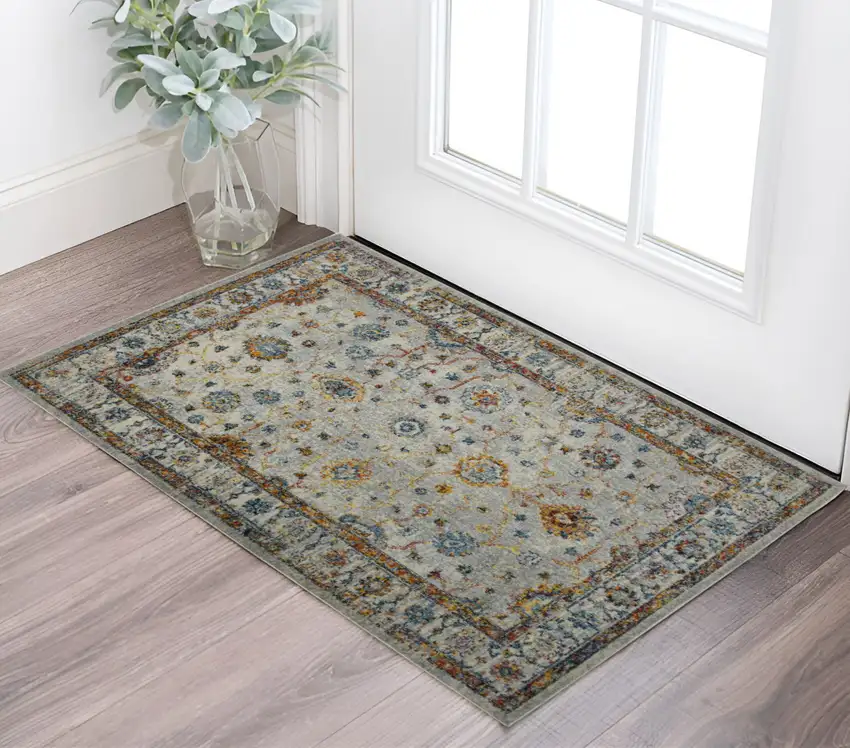 3' X 5' Orange and Ivory Floral Power Loom Area Rug Photo 1