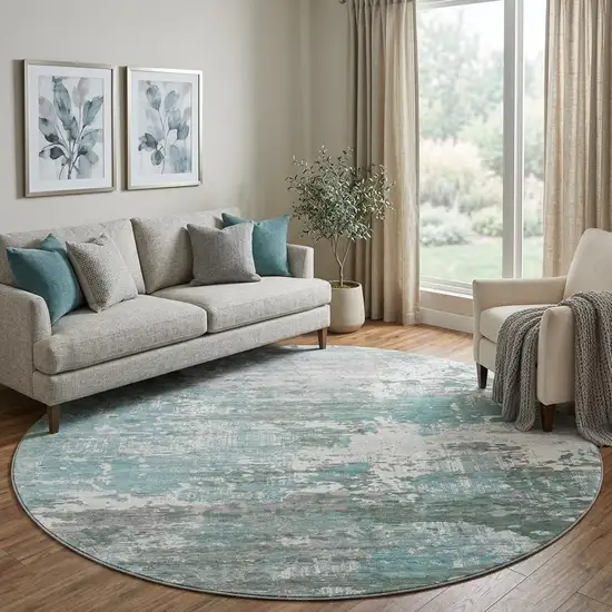 8' X 8' Pale Aqua Ivory And Gray Abstract Washable Round Rug With UV Protection Photo 1