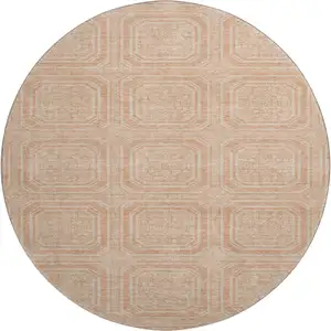 Photo of 8' X 8' Peach And Ivory Geometric Washable Round Rug With UV Protection