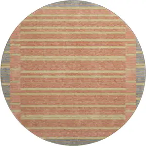 Photo of 8' X 8' Pewter Salmon And Gold Striped Washable Round Rug With UV Protection