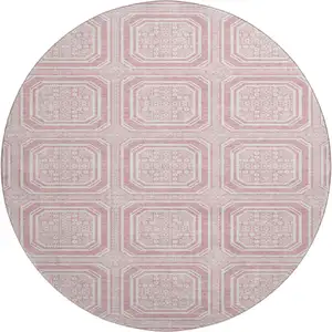 Photo of 8' X 8' Pink And Ivory Geometric Washable Round Rug With UV Protection