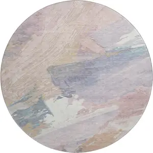 Photo of 8' X 8' Pink Ivory And Beige Abstract Washable Round Rug With UV Protection