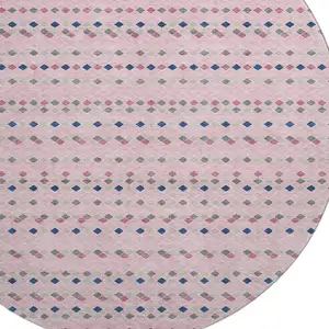 Photo of 8' X 8' Pink Navy Blue And Gray Striped Washable Round Rug With UV Protection