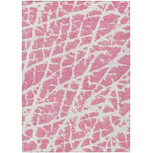 Photo of 3' X 5' Pink and Ivory Abstract Washable Non Skid Indoor Outdoor Area Rug