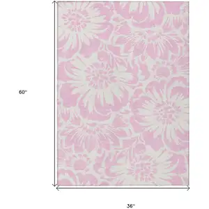 Photo of 3' X 5' Pink and Ivory Floral Washable Non Skid Indoor Outdoor Area Rug