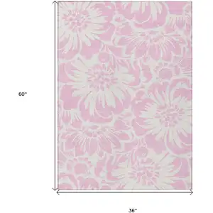 Photo of 3' X 5' Pink and Ivory Floral Washable Non Skid Indoor Outdoor Area Rug