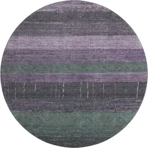 Photo of 8' X 8' Purple And Olive Green Striped Washable Round Rug With UV Protection
