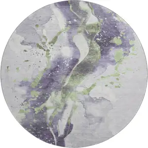Photo of 8' X 8' Purple Green And Ivory Abstract Washable Round Rug With UV Protection
