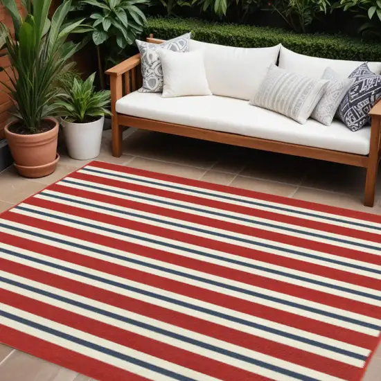 Red and Ivory Geometric Stain Resistant Indoor Outdoor Area Rug Photo 1