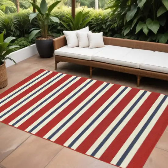 Red and Ivory Geometric Stain Resistant Indoor Outdoor Area Rug Photo 1