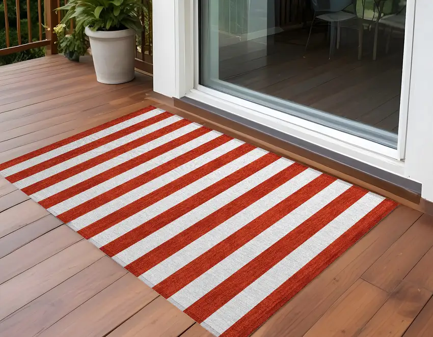 3' X 4' Red and White Striped Washable Non Skid Indoor Outdoor Area Rug Photo 1
